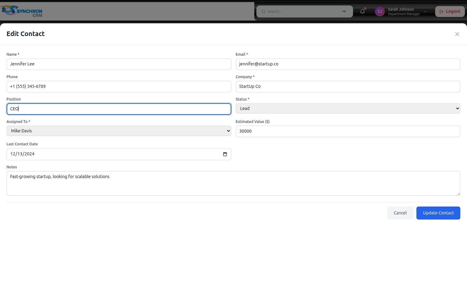 Edit Contact modal with the Assigned To dropdown open, showing available team members that can be assigned responsibility for this contact